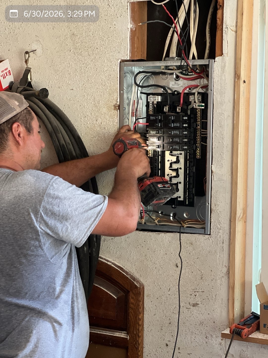 MVP technician working on an electrical panel installation