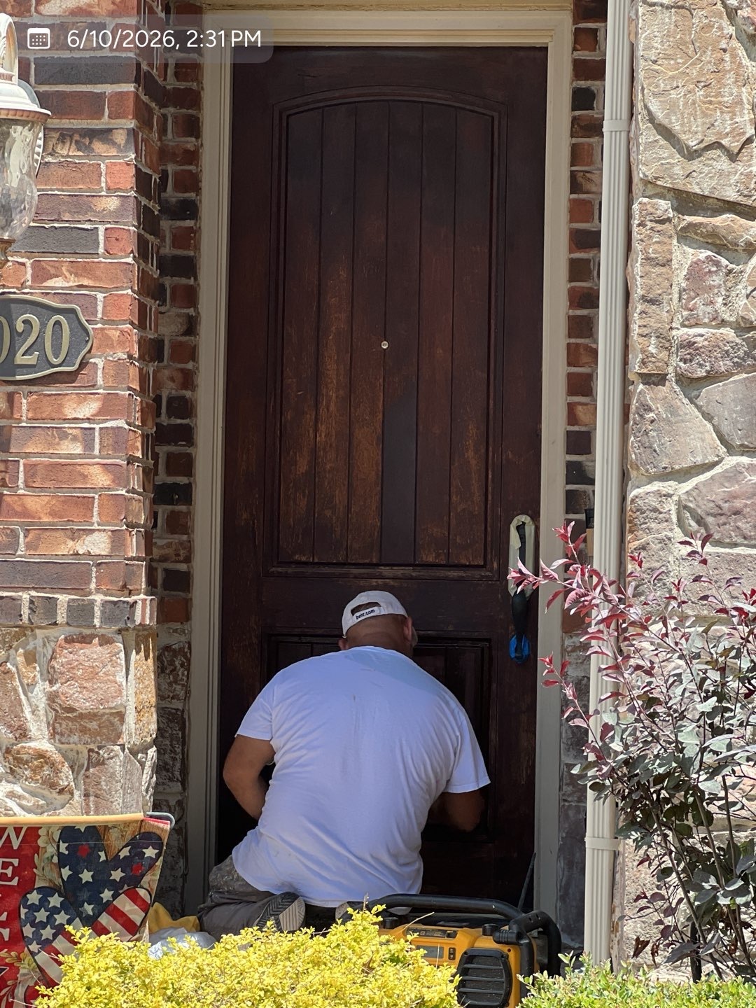 Residential front door before exterior refinishing by MVP